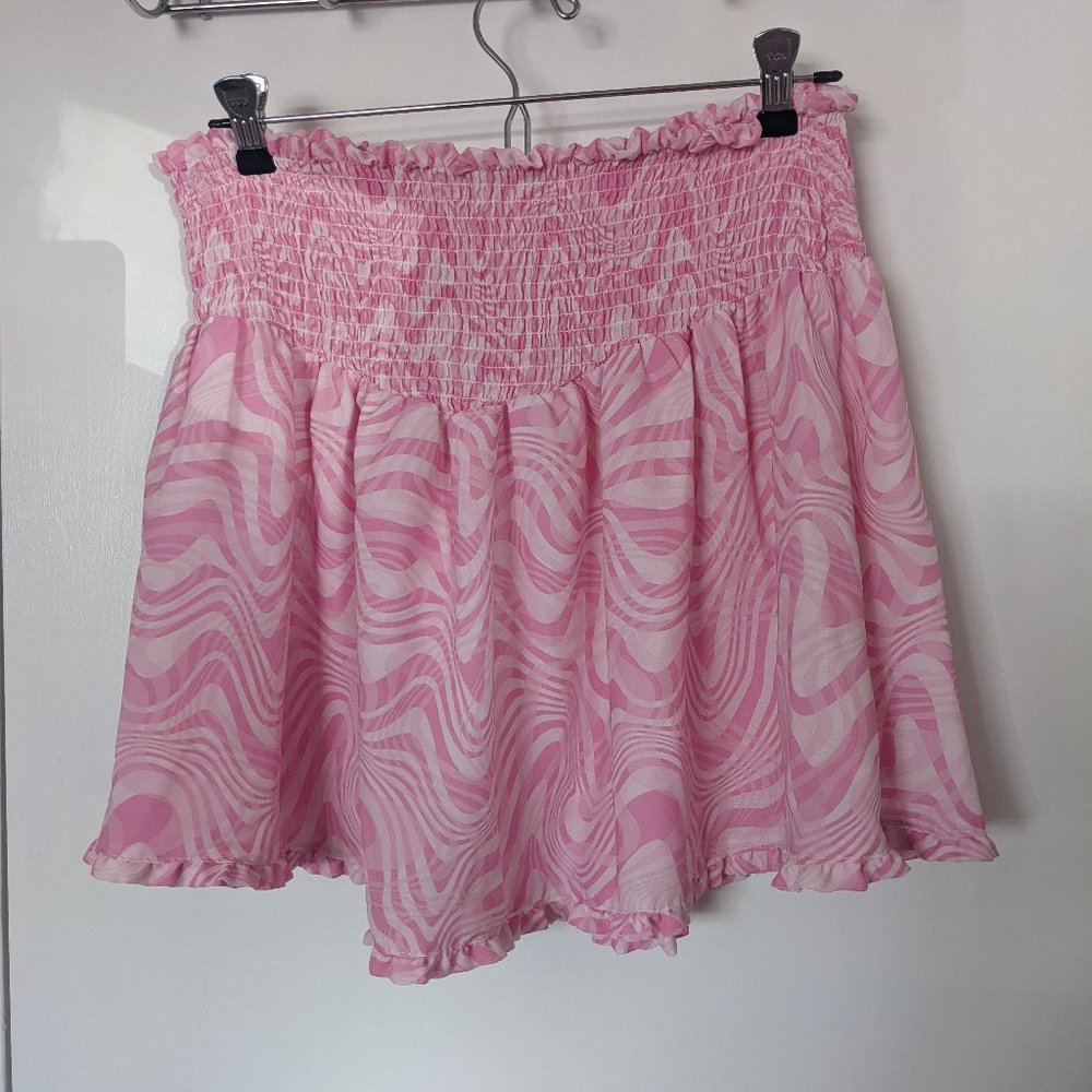 frilly pink patterned skirt